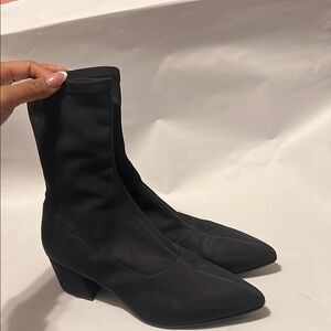 Sleek Black Heeled Boots with Suede Texture